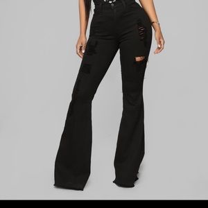 Black ripped flare jeans